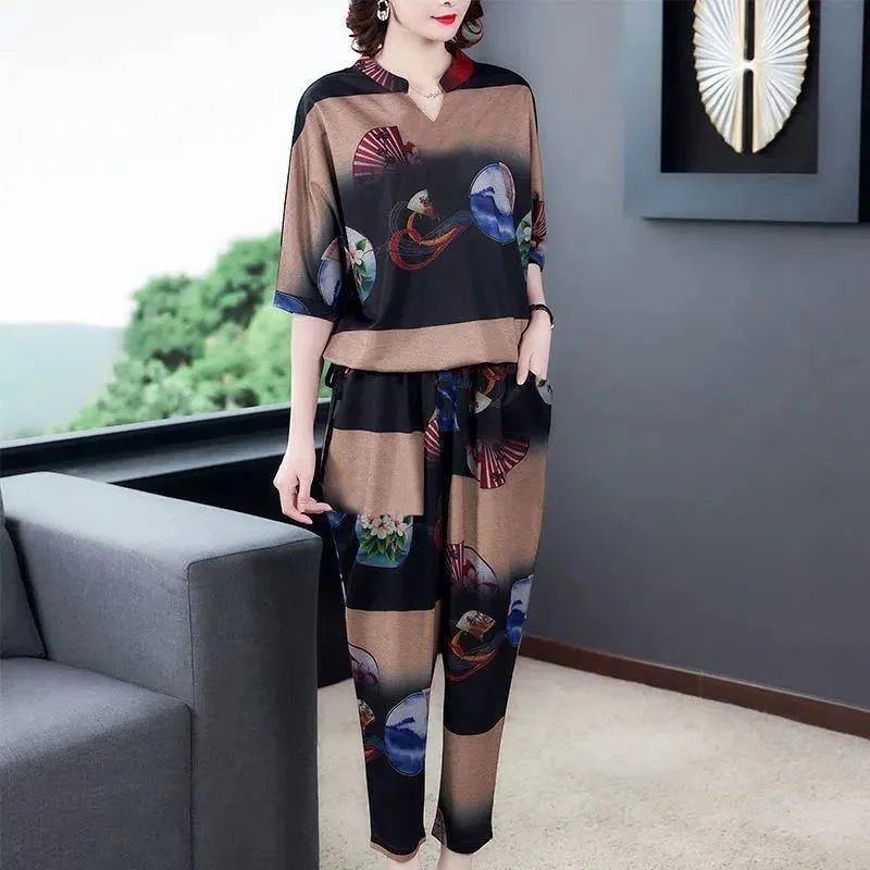 

Mom Elegant Loose Plus Size 4XL Outfit Women Printed Spliced V-neck Half Sleeve Pullover T-shirt+Design Capris Harem Pants Suit
