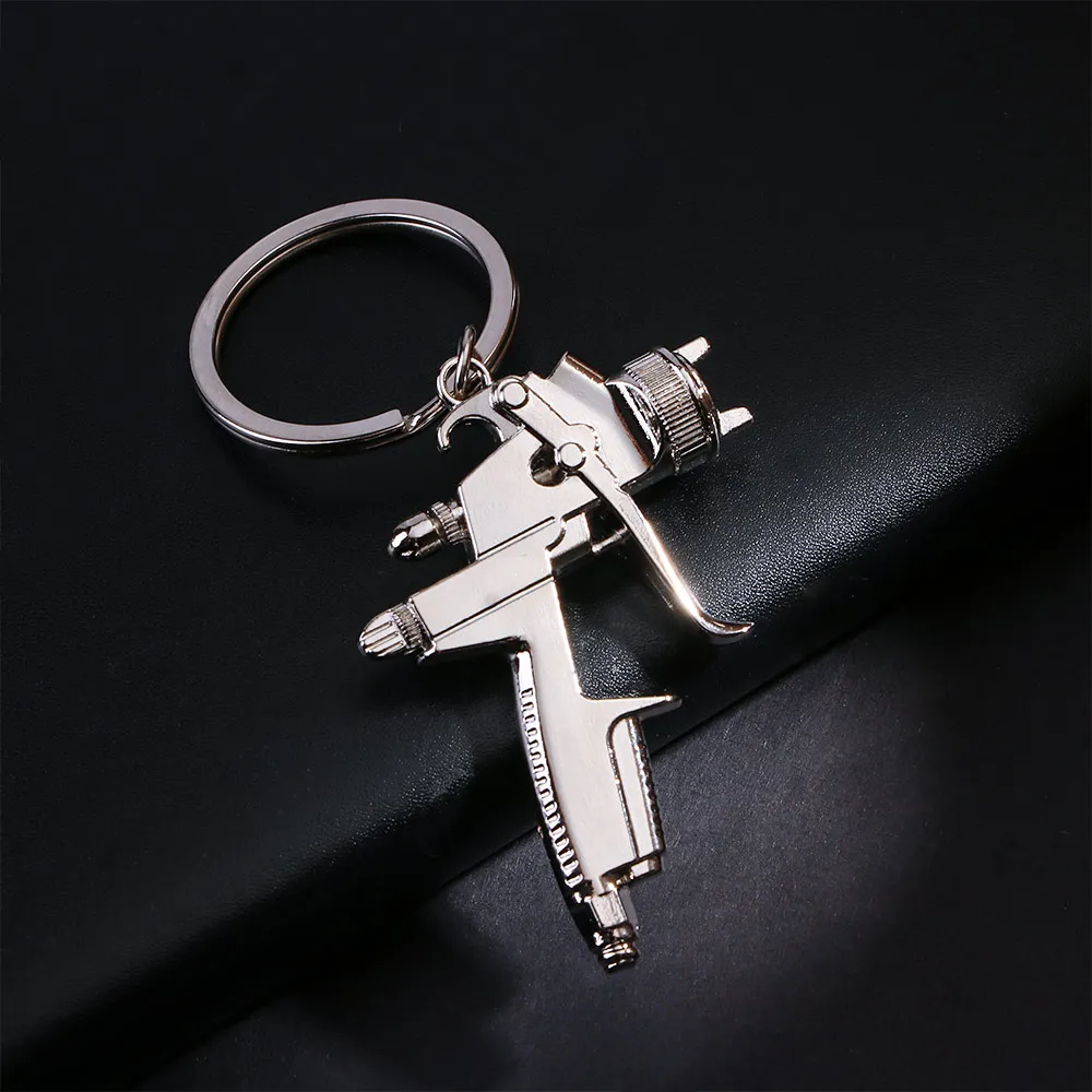 

Fashion Water Spray Gun Keychain Handbags Men Creative Car Bag Key Ring Accessories Pendant Hot
