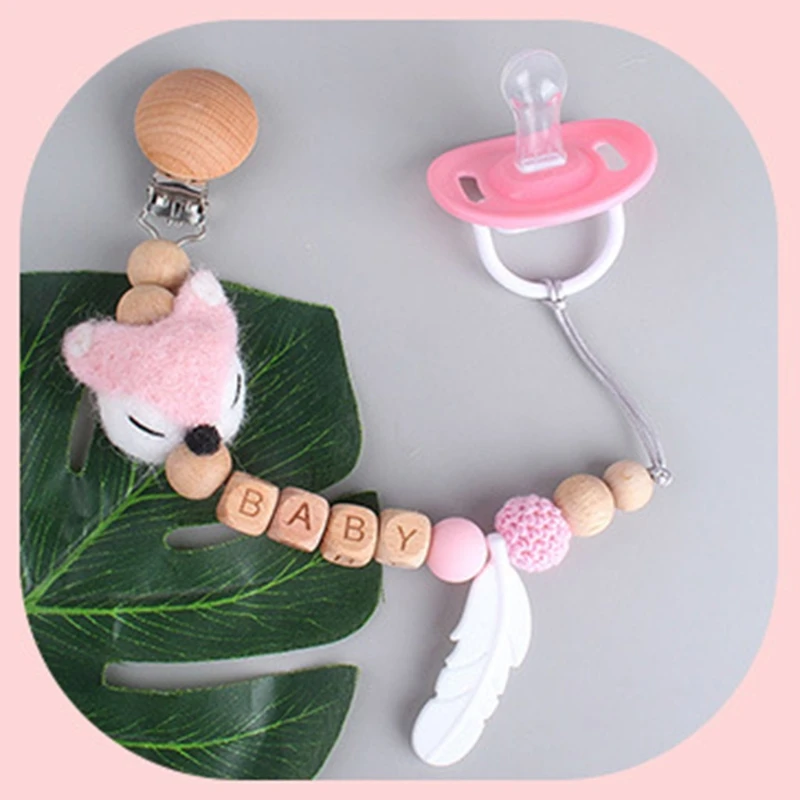 

Infants Teether Soother Baby Wood Pacifier Clip Dummy Holder Molar Toys Cartoon Animal Teething Chain Silicone Feather