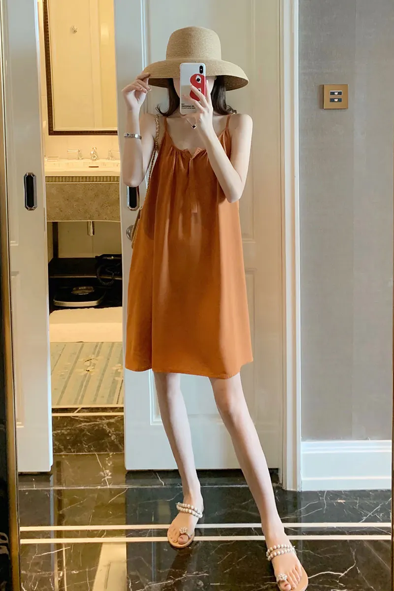 

2021 new seaside holiday beach skirt short loose and thin V-neck open back sling Sanya dress women's summer