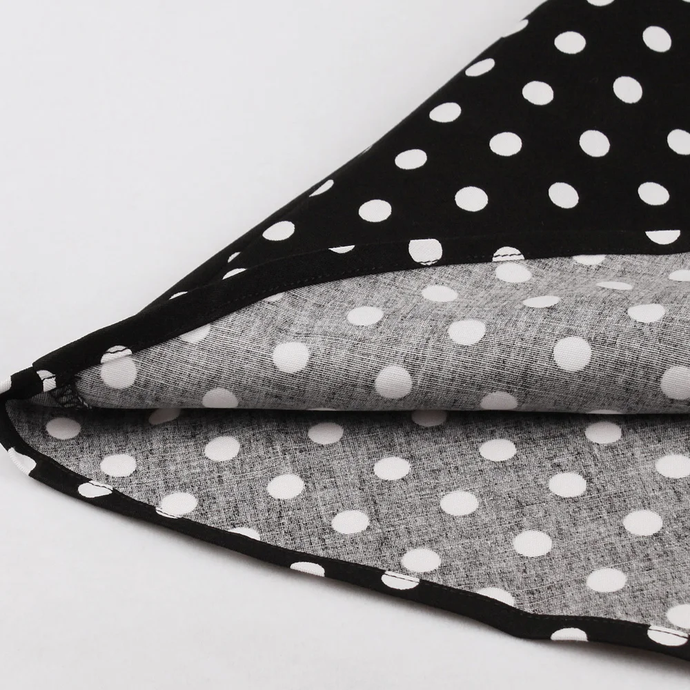 Женское винтажное платье в горошек черное из хлопка стиле ретро 60 х с V образным