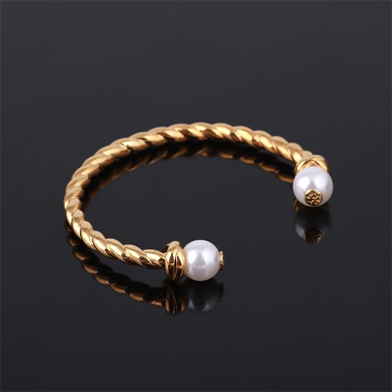 

Textured braided pearl gold logo opening adjustable bangle pearl diameter 1.2cm