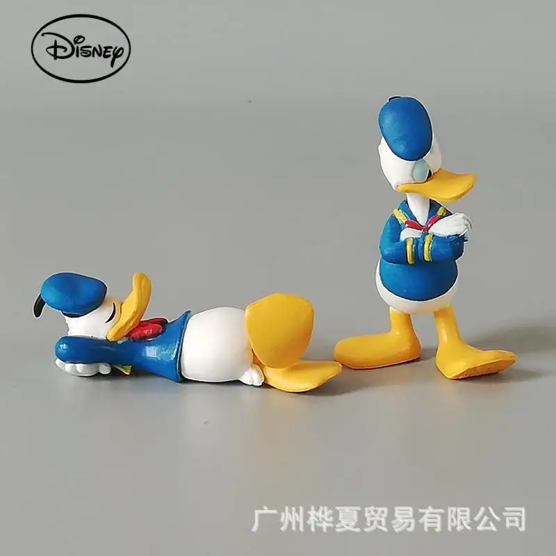 

2 pieces anime Disney cartoon, cute2Donald Duck PVCDonald Duck garage kits model furnishing articles dolldiyCake decorations