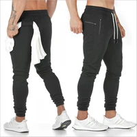 2021 spring and autumn new muscle brothers sports fitness trousers mens foot pants zipper pocket solid color casual pants