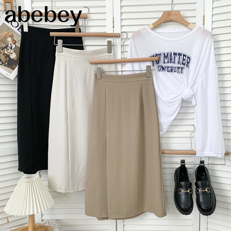 

Temperament versatile solid color Skirt high waist pleated solid color mid-long A-line split Skirt 2021 New Spring Autumn