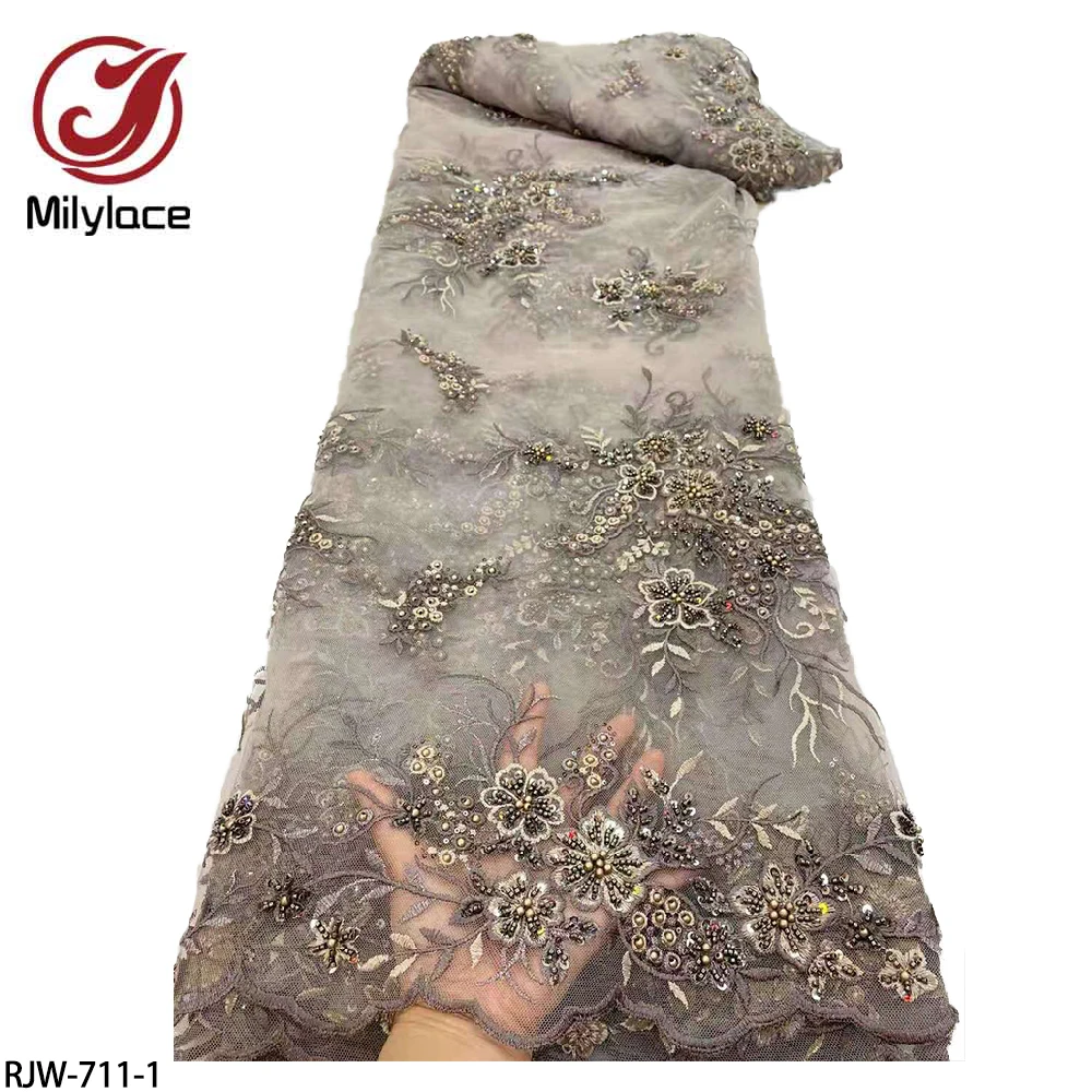 

Элегантный в африканском стиле вышитые кружева тюль ткань модные ручные Кружева из бисера французская сетчатая ткань для вечерние RJW-711