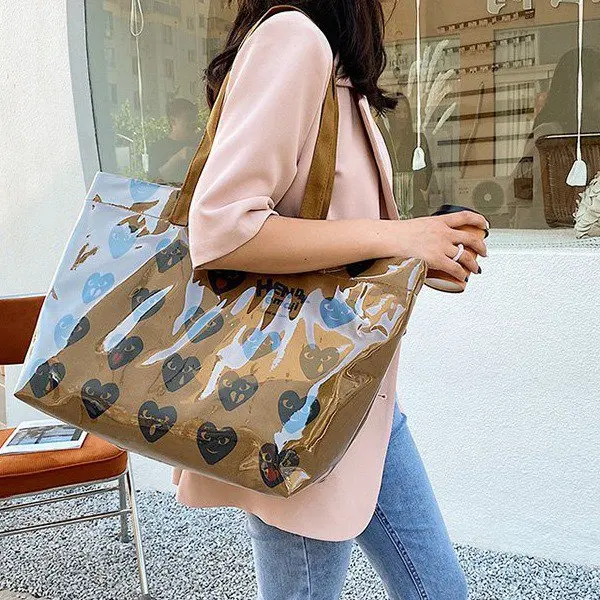 

Rei Kawakubo CDG Christmas kraft paper shopping bag big bag female spoof portable pvc waterproof oneshoulder tote bag