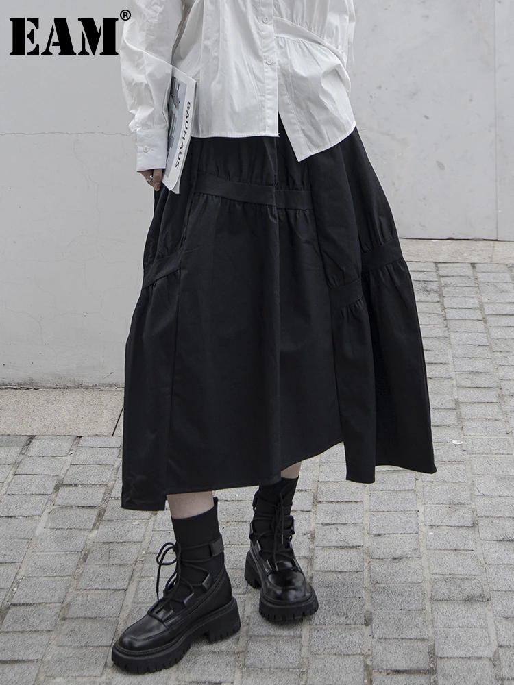

[EAM] черная плиссированная Асимметричная длинная повседневная юбка с высокой эластичной талией, женская модная юбка, новинка, весна-осень 2022...