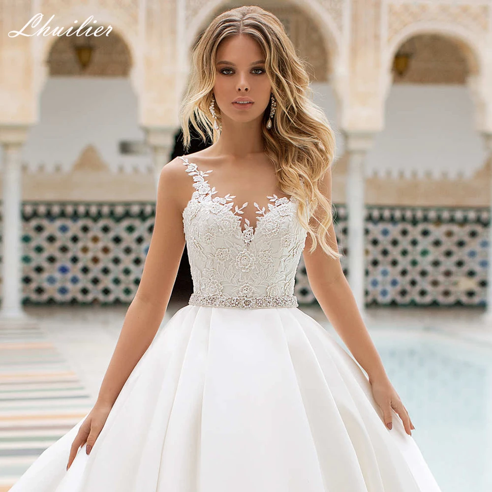

Lhuilier Elegant A-line Satin Wedding Dresses Sleeveless Floor Length Lace Appliques Backless Bridal Dress with Belt