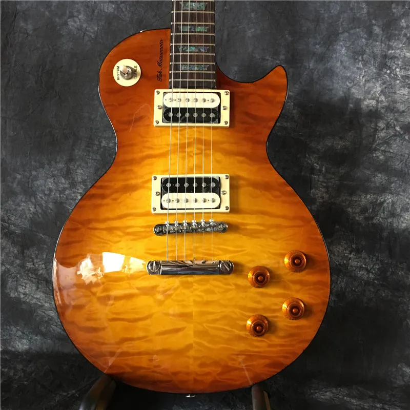 

High-quality 6-string electric guitar, mahogany body,quilted maple top,