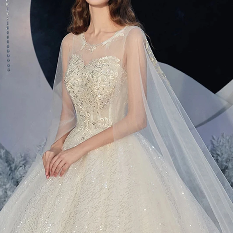 

Wedding Dresses Illusion O-Neck Sleeveless Beading Sequined Pearls Tulle Lace Up Train Luxury Champagne Women Bridal Gown GB408