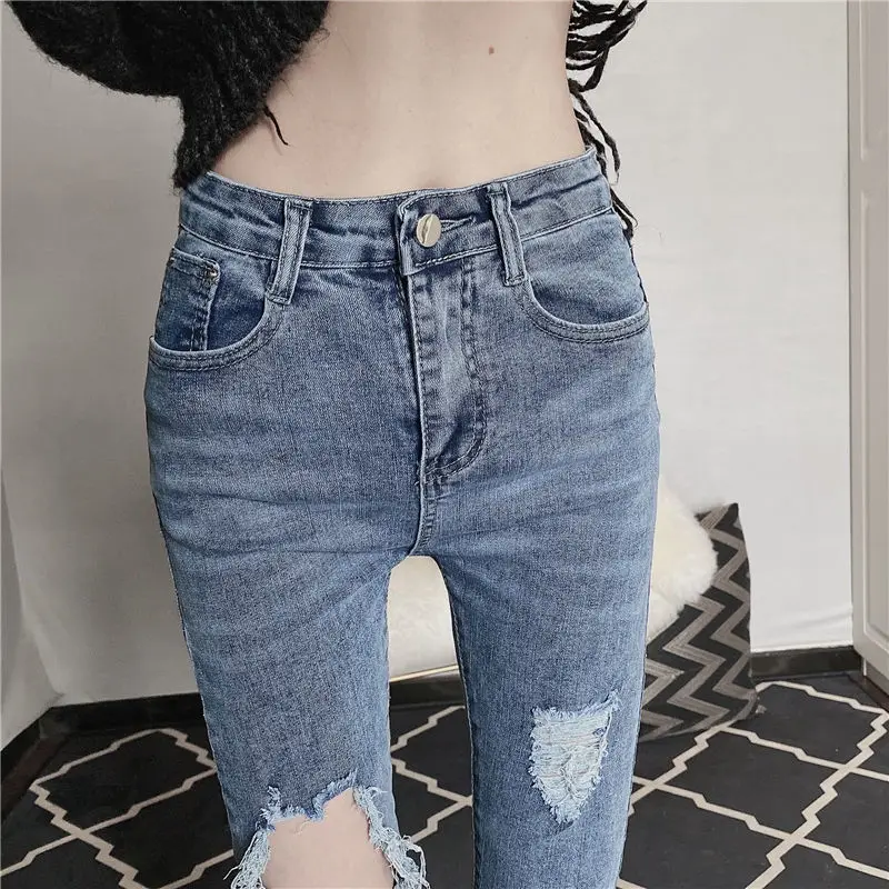 

High waist jeans 2021 new Korean versatile tight show thin personality hole pencil pants women's wear