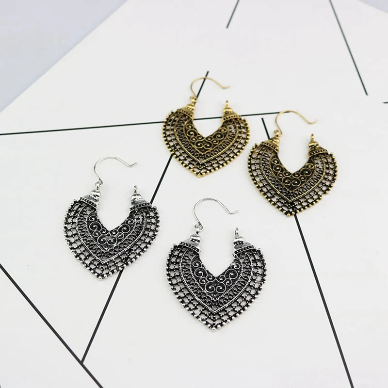 

Classic Bohemian Fashion Ethnic Style Earrings Retro Hollow Carved Earrings New Personality U-shaped Earrings