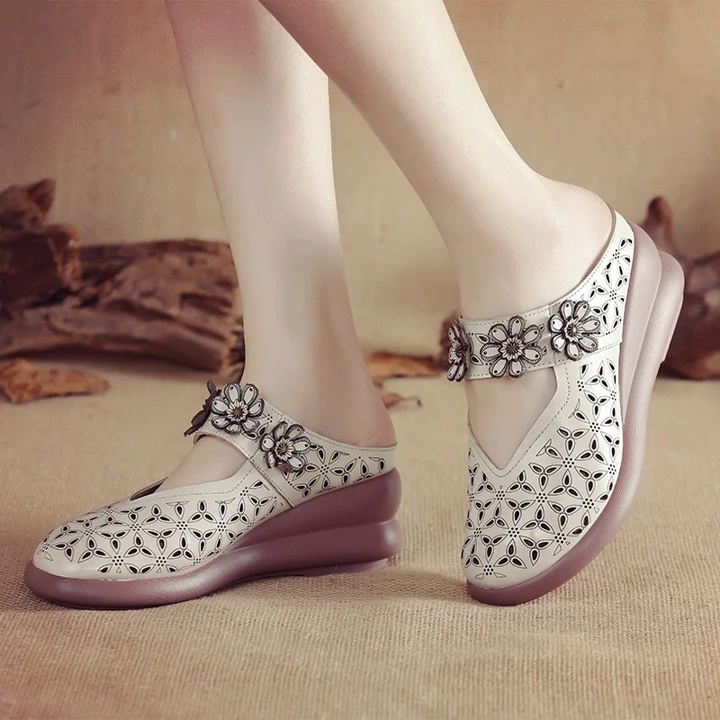 

New leisure thick soled comfortable women's slippers national style hollow out leather sandals anti slip mother's slippers