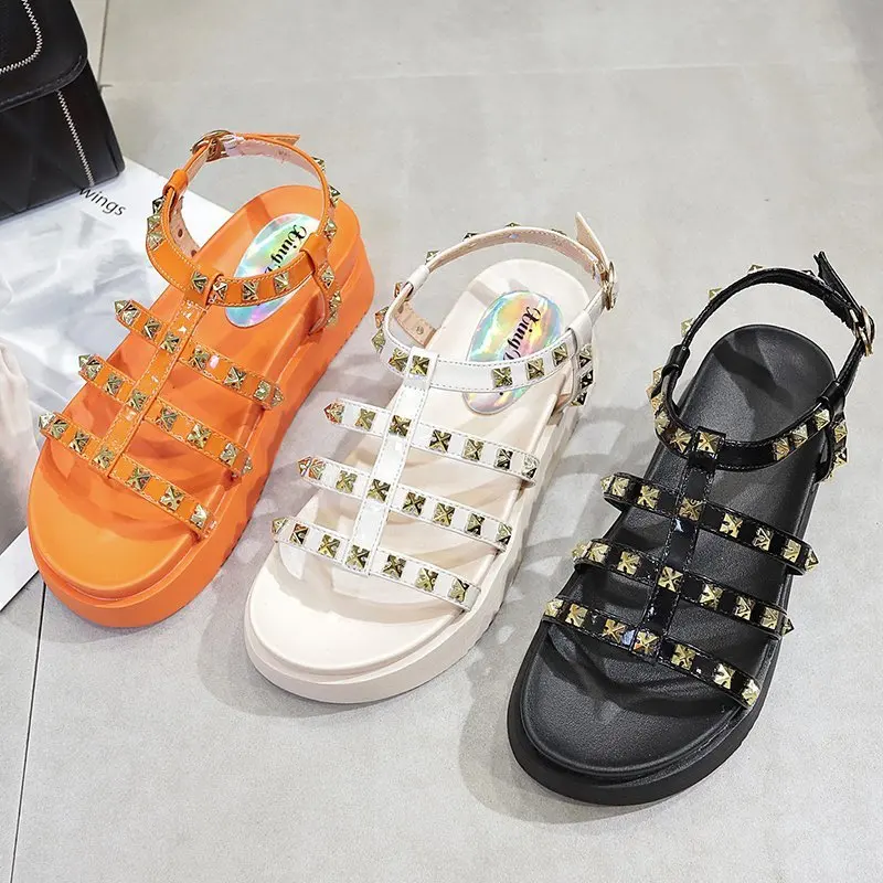 

Sandals female rivets thick bottom shoes 2020 new summer students comfortable thick bottom beach Roman sandals fairy style Z812