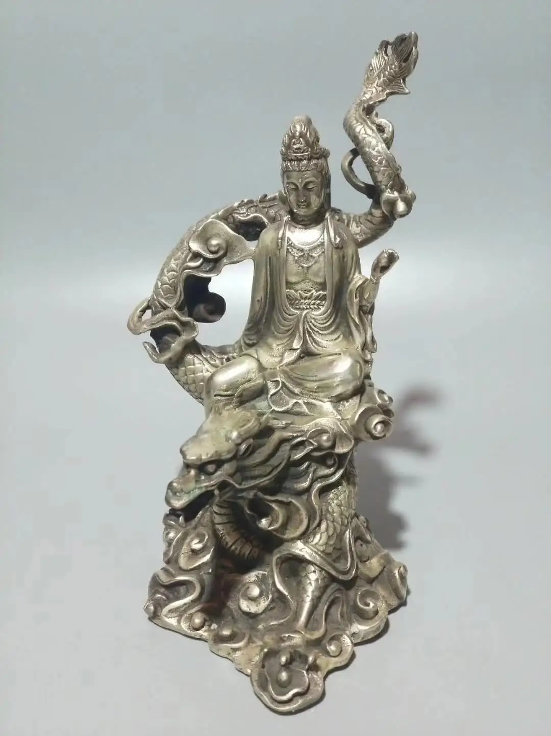

Collection Tibet Silver Handmade Carved Guanyin Kwan-yin Bodhisattva Riding Dragon Buddha Statue Home Decoration