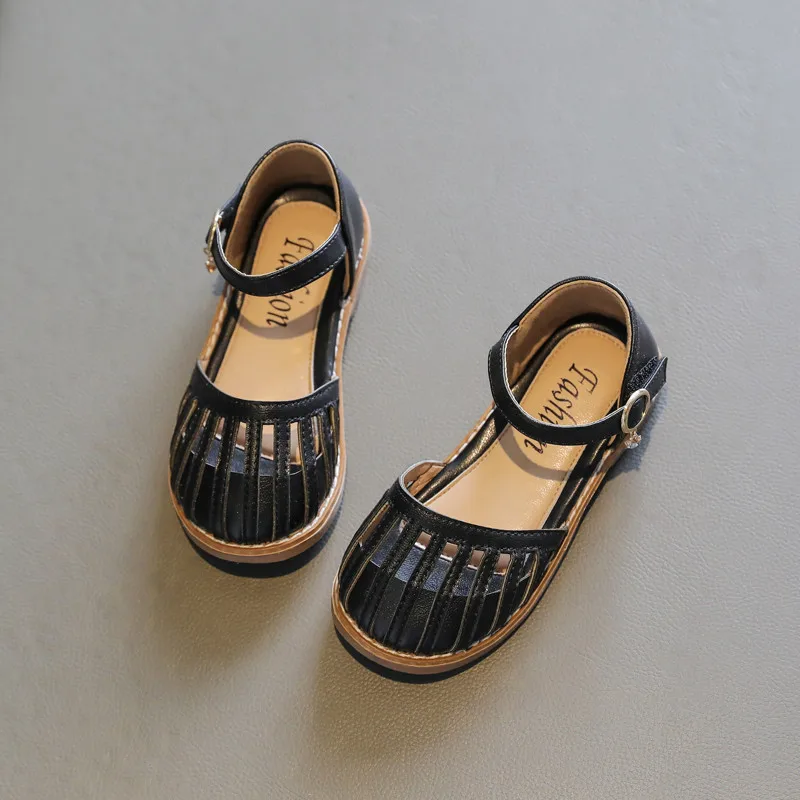 

Girls' sandals 2021 new summer hollow Baotou Princess middle school children's soft soled antiskid children's beach shoes