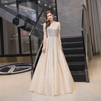 sparkly sequined short sleeves evening dresses gold boat neck a line illusion formal party gowns robe de soir%c3%a9e de mariage 2021