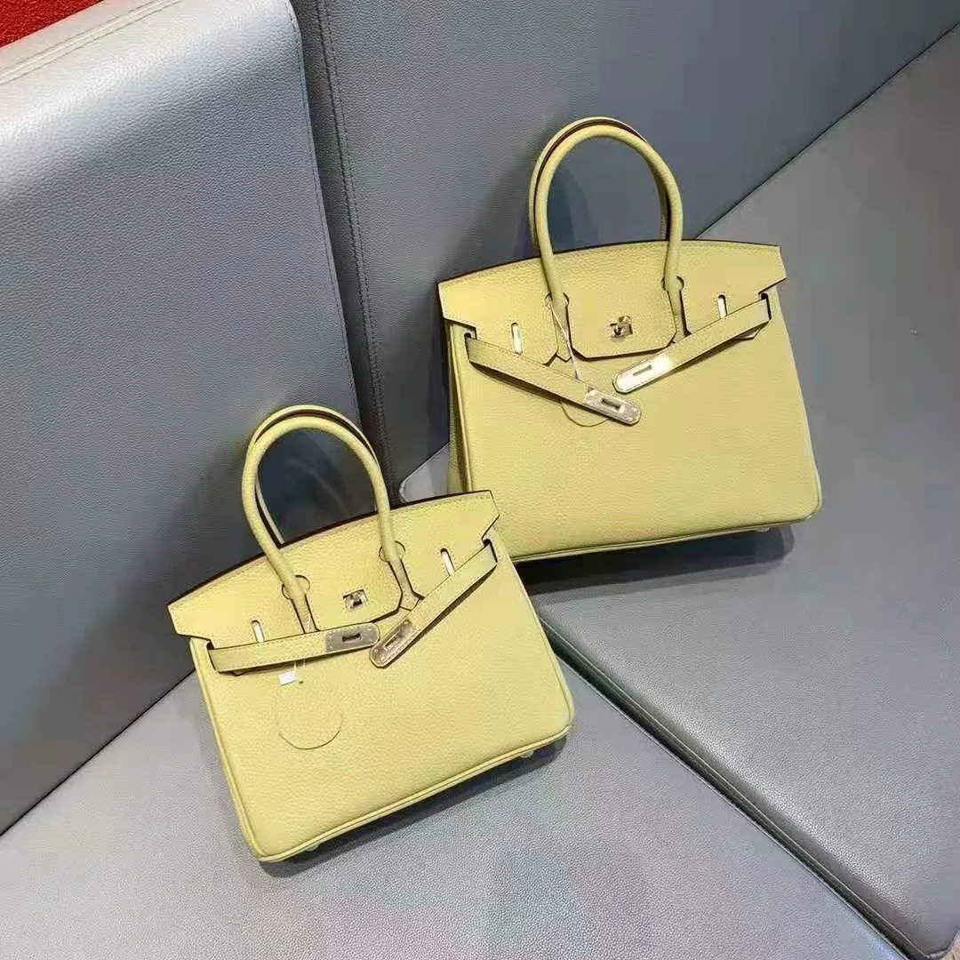 

Leather women's bag fashion bag lychee grain head layer cow leather portable One Shoulder Messenger Bag