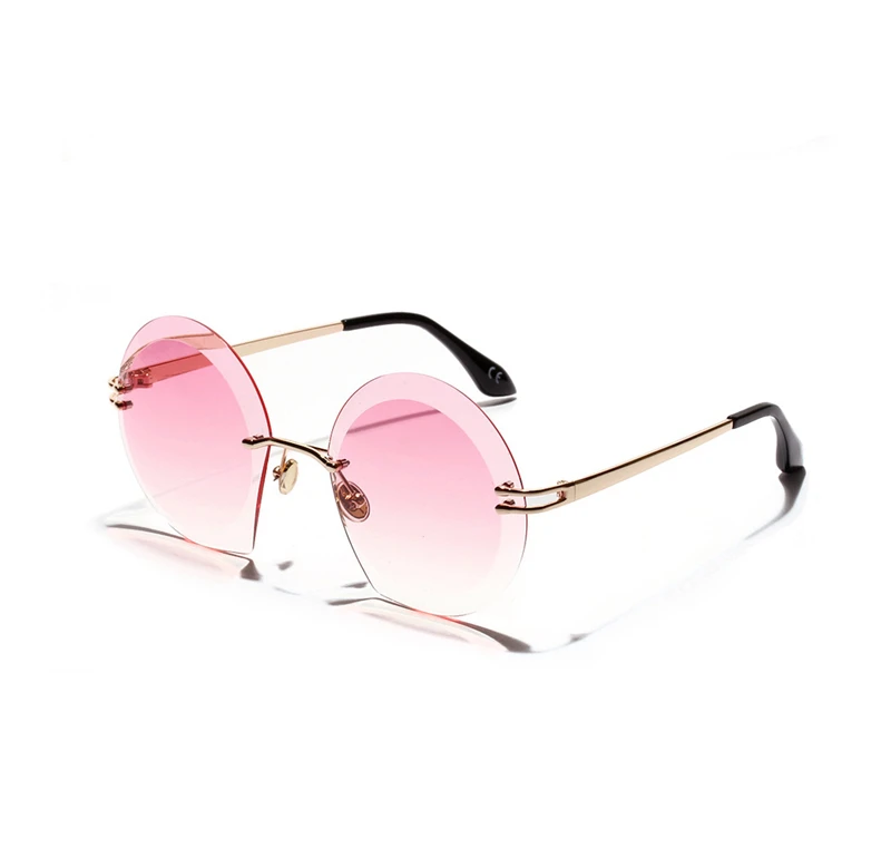 Модные солнцезащитные очки без рамки с большим круглым вырезом женские в стиле