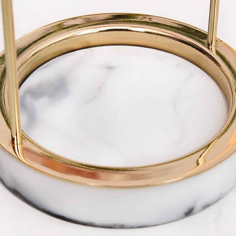 

Kili Nordic Exquisite Gold Jewelry Display with Marble Stand Minimalist Chic Ins Metal Jewelry Rack Design Models Earrings Brace