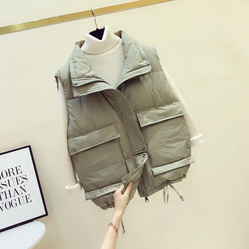 Женский короткий жилет с карманами теплый отложным воротником повседневная