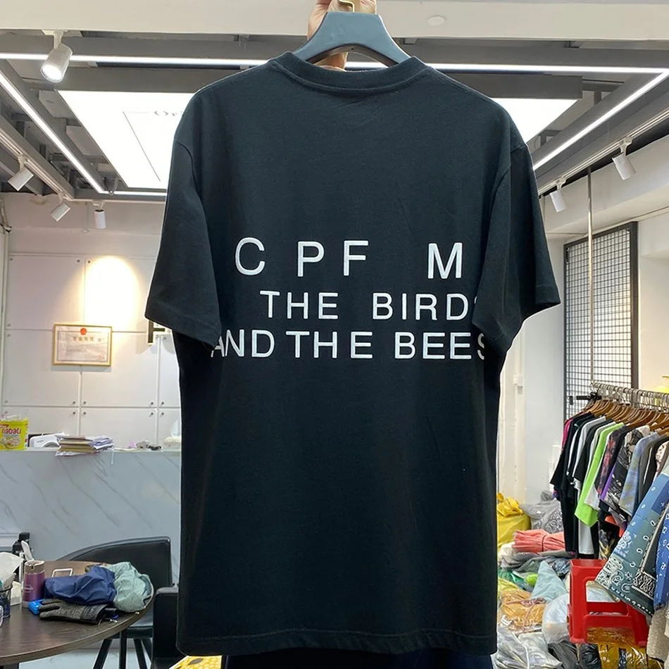Черная футболка CPFM для мужчин и женщин FREEE принт пламя с коротким рукавом