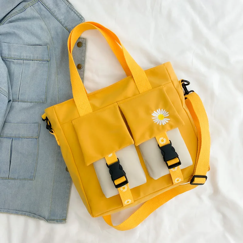 

Casual canvas one-shoulder girl bag belt decoration new large-capacity student hand bag double pocket zipper travel diagonal bag