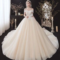 shiny ball gown wedding dresses with pearls bow vestido de noiva princesa sweetheart neck lace up short sleeve elegant dress