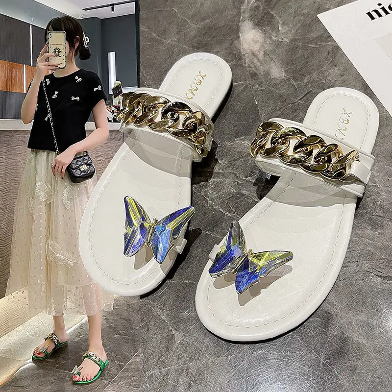 

Korean low heel slippers for women's wear 2021 summer new fashion antiskid fairy style flat bottom clip toe flip flop