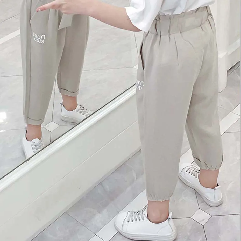 Летние штаны для девочек шаровары с надписью школьные повседневные брюки бантом