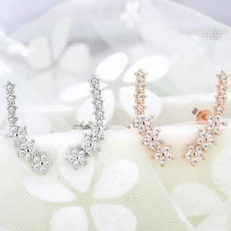 Женские Двухсторонние серьги-гвоздики с фианитами в форме звезд Цвет Розовое