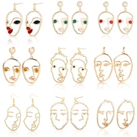 women simple personality human face pendant earrings retro abstract hollow metal fashion earrings jewelry