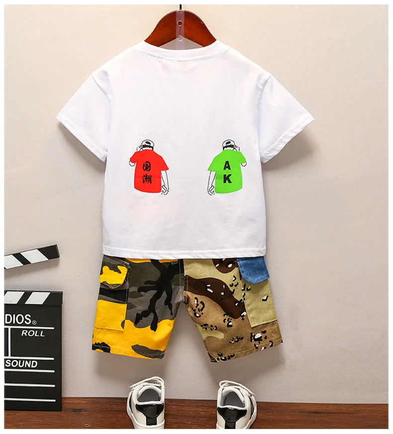 

Детские комплекты одежды для мальчиков, лето 2020, новая детская футболка с короткими рукавами и принтом для мальчиков + камуфляжные шорты, ко...