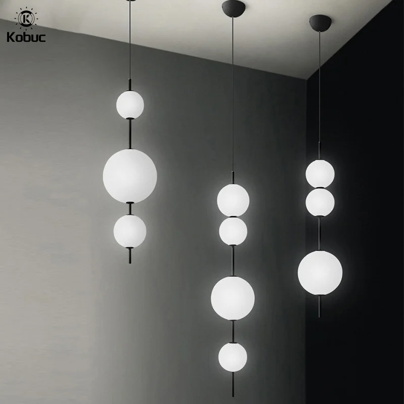 

Kobuc Italy Design Round Ball Glass Hanging Lighting Fixture Post-Modern Vertical Pendant light for Bedside Cloth Store Bulb In