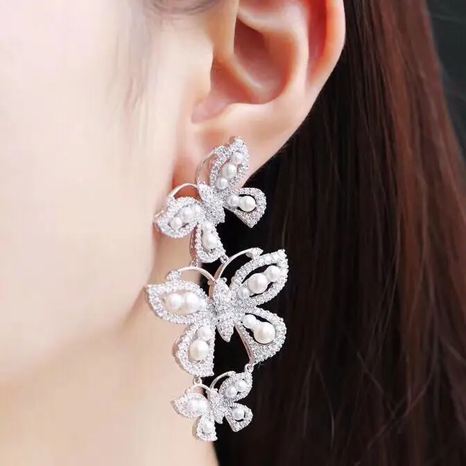 

2020 new exaggerated luxury leaves pearl asymmetric butterfly earrings elegant personality wild ins design women's brand jewelry