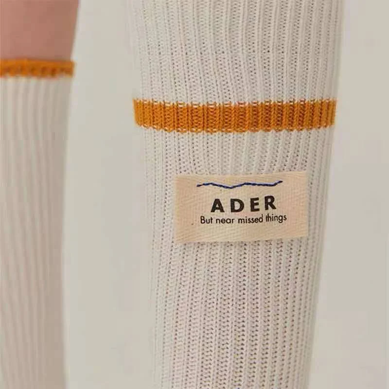 

Best Quality Ader Error Sock Asymmetry Length 2021 Men Women Hip-Hop Sportsock High street Sharp seam Label Socks Fashion Dress
