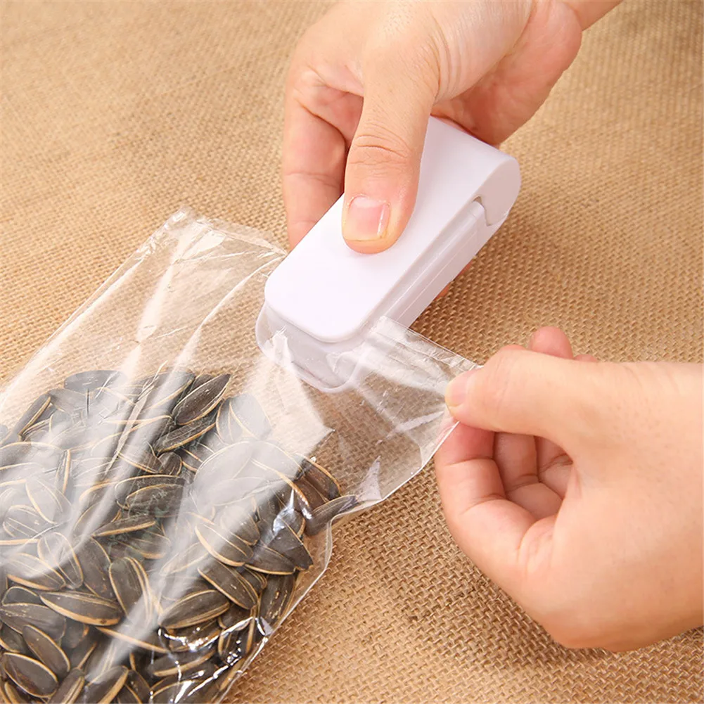 

Portable Mini Sealing Machine Safe Hand-pressed Snack Plastic Bag Sealer Storage Bag Clips Kitchen Accessories Tools