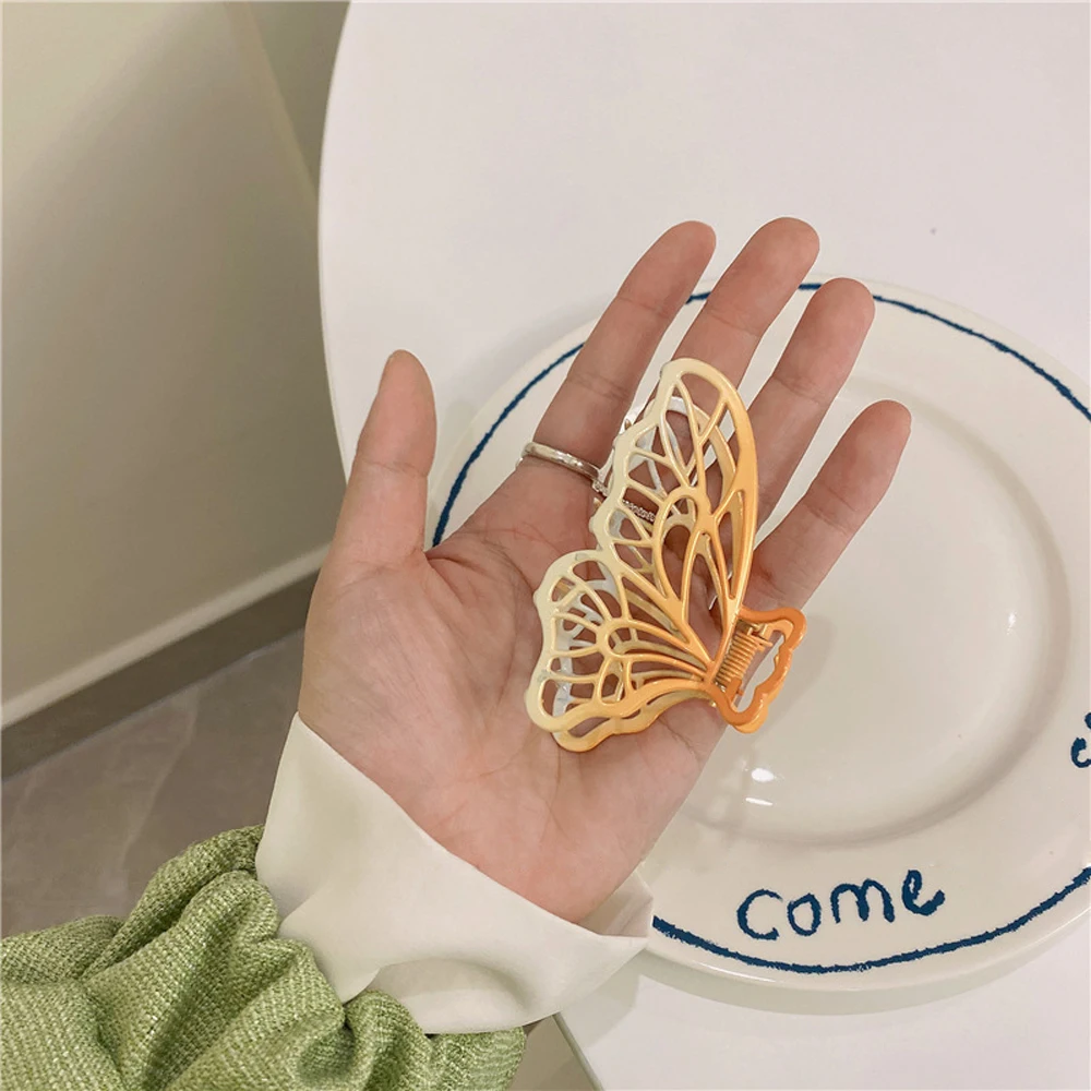 

New Korean Colorful Gradient Metal Shark Catch Clip Irregular Geometric Hollow Butterfly Pattern Women Electroplating Hair Claw