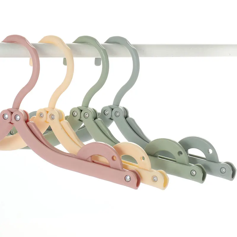 

Folding Clothes Hanger Organizer Magic Stretch Multifunction Wardrobe Storage Rack Travel Supplies Hanger Drying Rack 2021 New