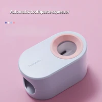 automatic toothpaste squeezing device strong and non marking sticking toothpaste device squeezing artifact toothbrush holder