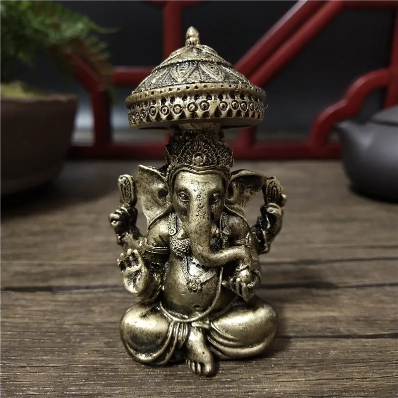 

Lord Ganesha Buddha Statues Home Decoration Bronze Color Resin Elephant Hindu God Sculpture Figurines Ornaments Lucky Gifts