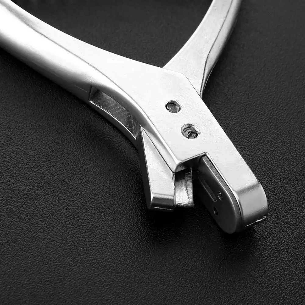 Металлический ручной перфоратор для пробивки отверстий значок с фото инструмент