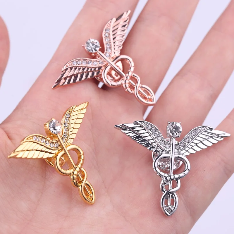 

Fashion Enamel Pin Jewelry Personality Angel Wings Snake Surround Crystal Brooch Cute Lapel Pin Accessories for Part Deco Unisex