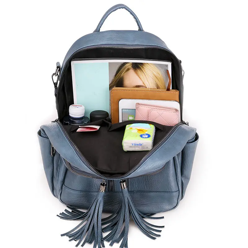 Женский рюкзак из мягкой искусственной кожи синий с небольшой кисточкой и