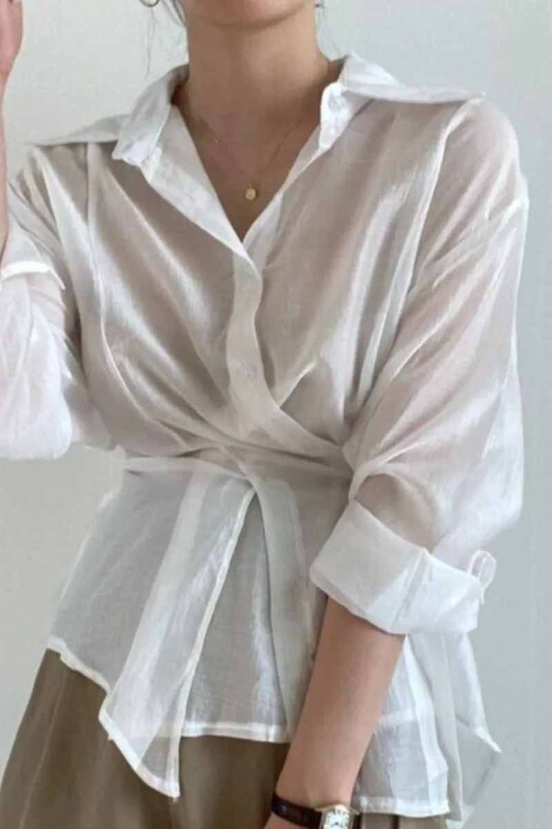 

Korean chic summer design sense niche irregular buttoned waist lapel thin long-sleeved shirt women
