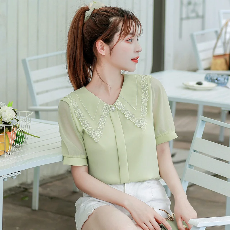 

Spring and summer solid color blouse V-neck tassel chain short-sleeved ice silk slim t-shirt one