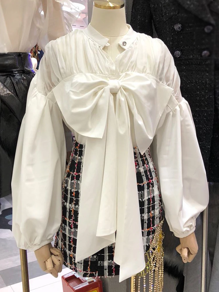 

Free shipping solid color hollow pleated zou stitching bowknot loose shirt ladies autumn new style personality all-match top