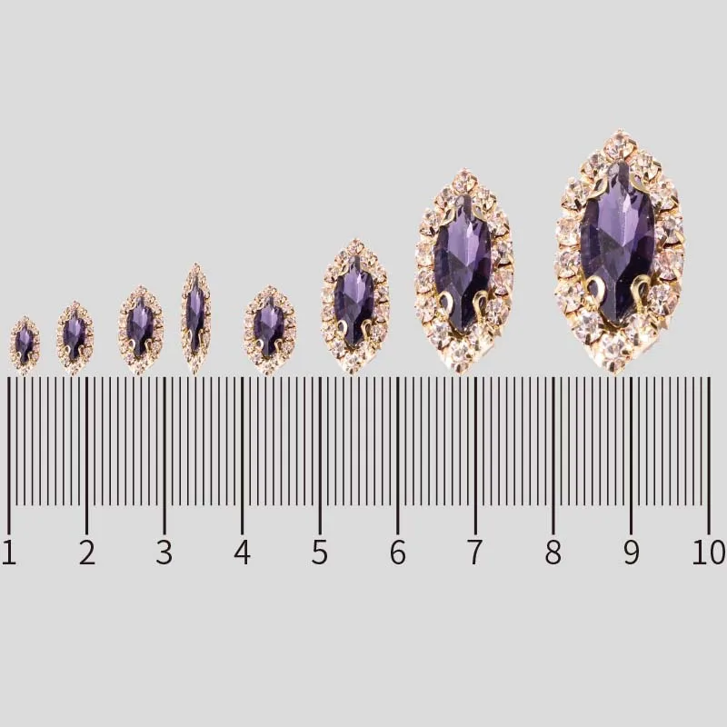 Украшение в виде конского глаза стразы с золотыми кристаллами кружева шитье