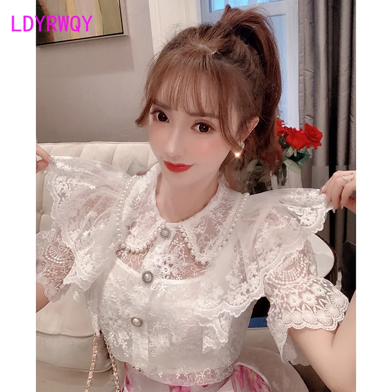 

French retro lace shirt tops women's new summer air hollows were thin short sleeves Turn-down Collar Solid